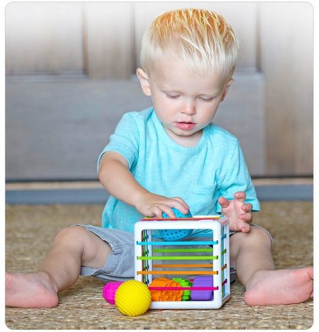 boite à objet - jeu de motricité Montessori