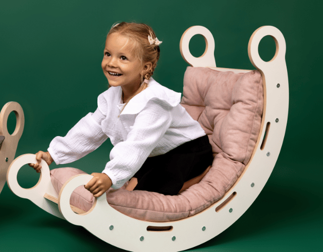 white wooden dream rocker with pillow and slide medium