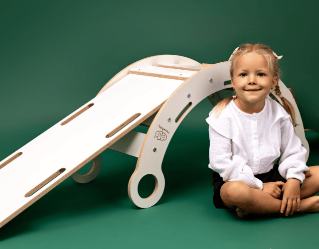 white wooden dream rocker with pillow and slide medium
