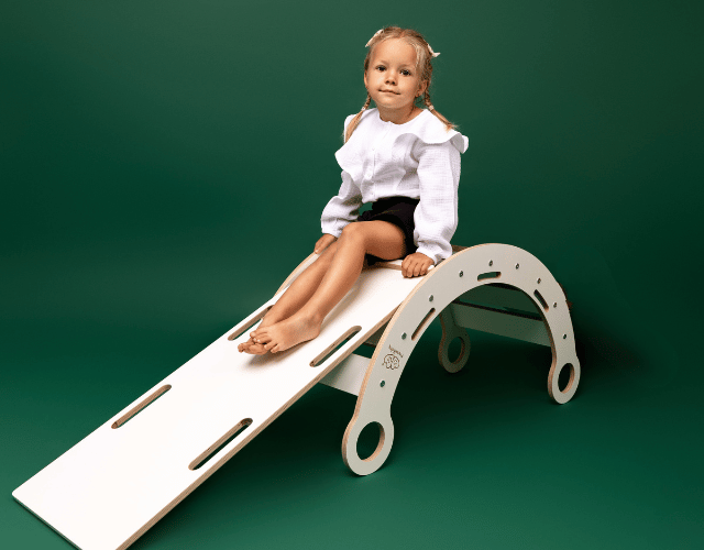 white wooden dream rocker with pillow and slide medium