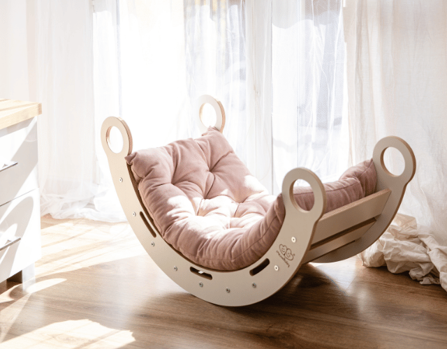 white wooden dream rocker with pillow and slide medium