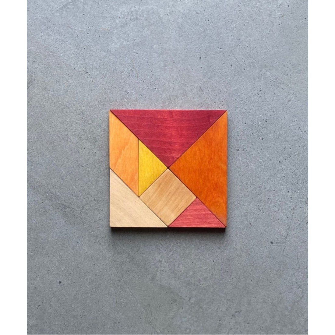 wooden story tangram – warm color (in storage bag)